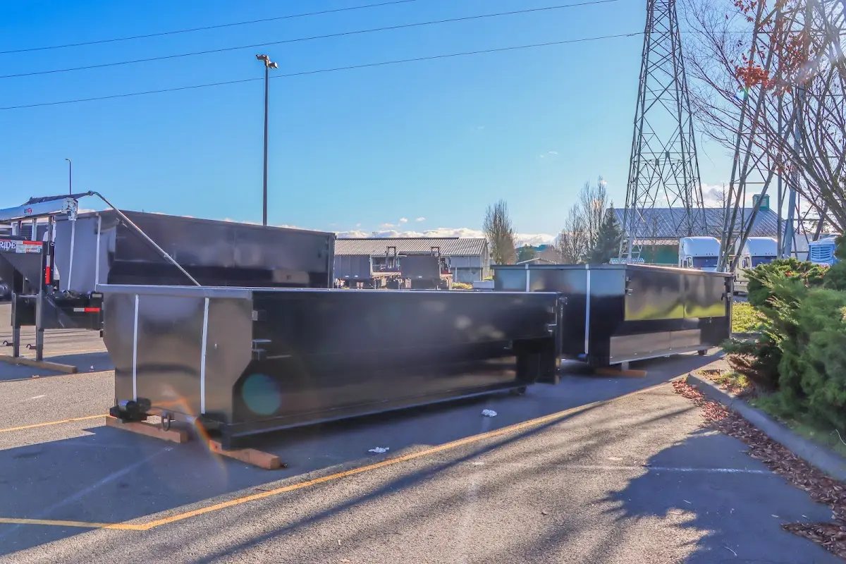 Roll-off dumpster ready for waste disposal at job site for 8 Yard Dumpster Rental in Clinton